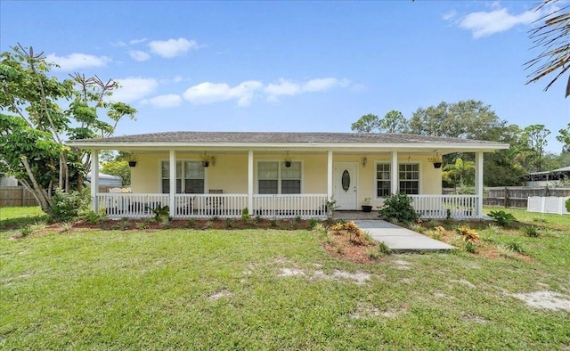 view of front of house with a front lawn and a porch