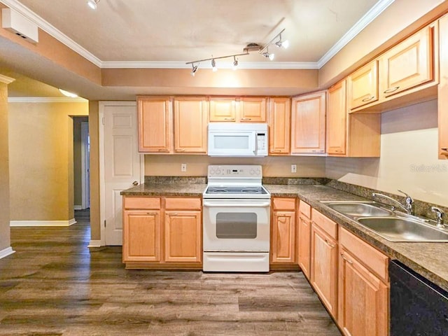 kitchen with sink, white appliances, dark wood-type flooring, and crown molding