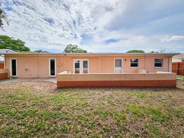 back of house featuring a patio