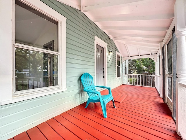 wooden deck featuring covered porch