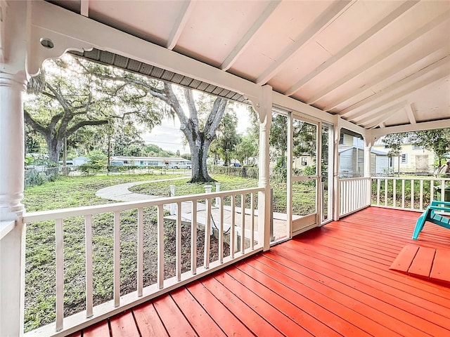 wooden terrace with a porch