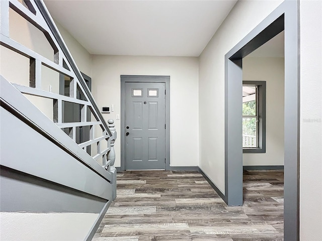 foyer entrance featuring hardwood / wood-style floors