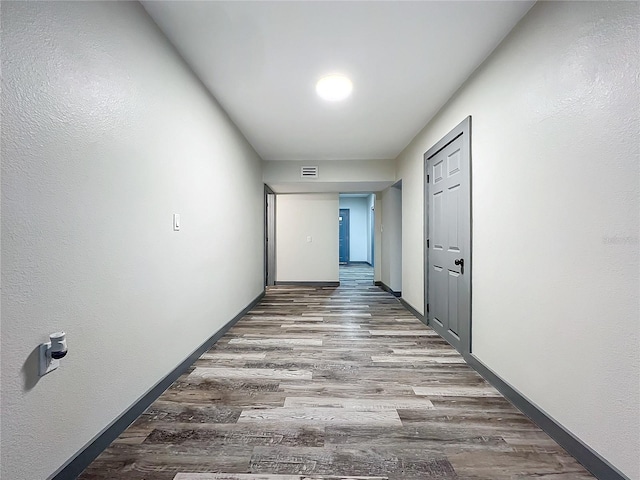 hall featuring hardwood / wood-style floors