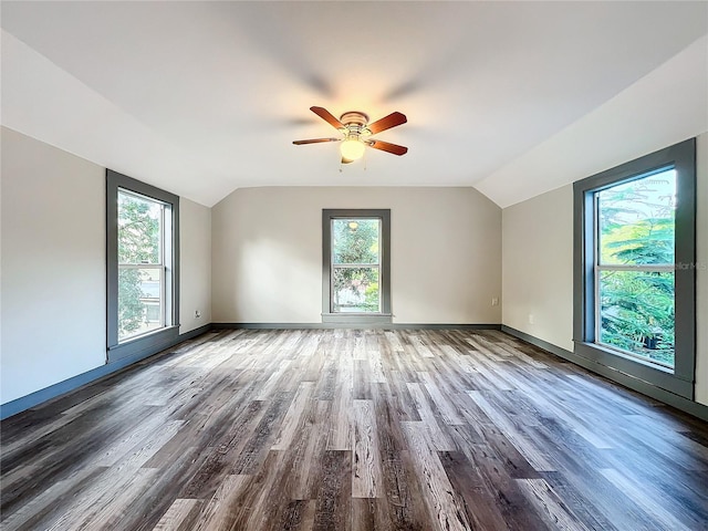 bonus room with ceiling fan, wood-type flooring, and vaulted ceiling