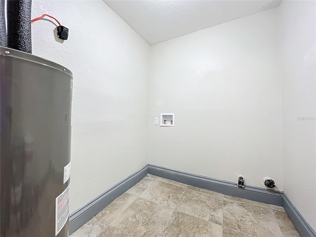 laundry room featuring tile patterned flooring and washer hookup