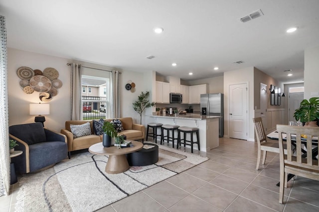 living room featuring light tile patterned floors