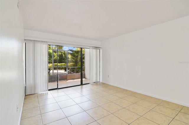 unfurnished room featuring light tile patterned floors