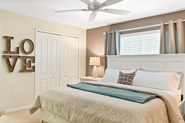 bedroom with a closet, ceiling fan, and carpet