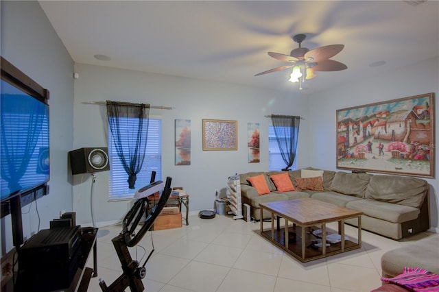 tiled living room featuring ceiling fan