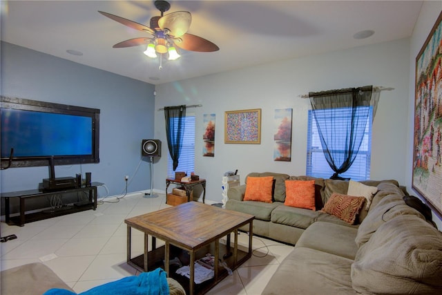 tiled living room featuring ceiling fan