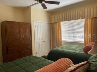 bedroom with a closet and ceiling fan