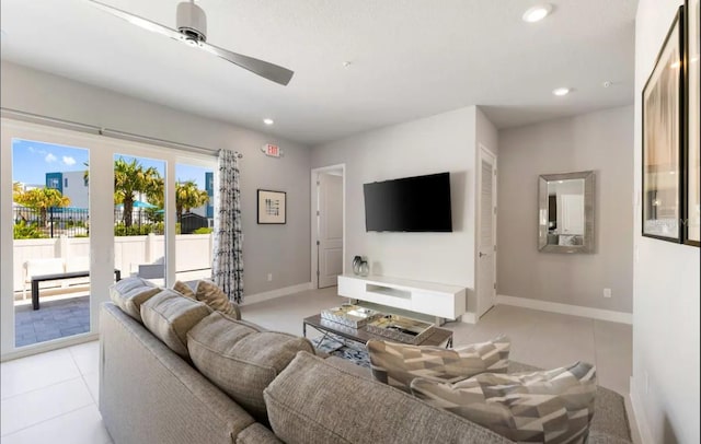 tiled living room with ceiling fan