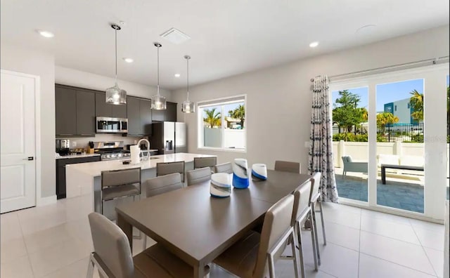 tiled dining space with sink