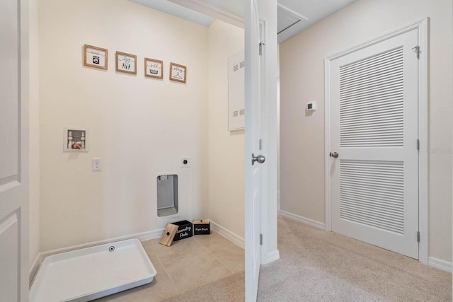 washroom featuring hookup for a washing machine, light carpet, and electric dryer hookup