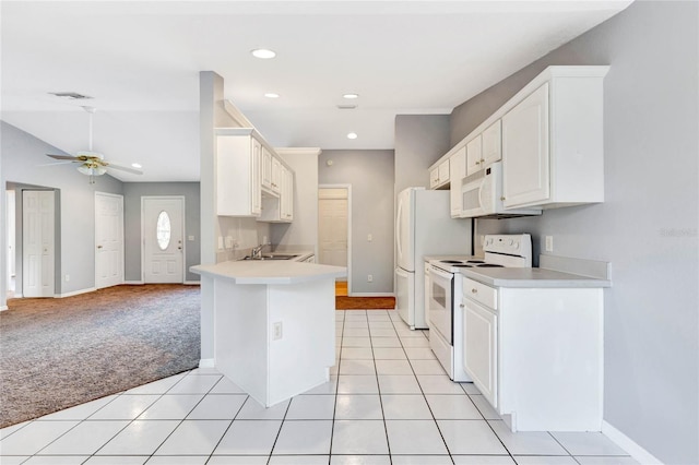 kitchen featuring white cabinetry, sink, kitchen peninsula, light carpet, and white appliances