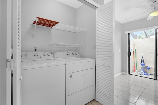 washroom with ceiling fan, washing machine and clothes dryer, and light tile patterned floors