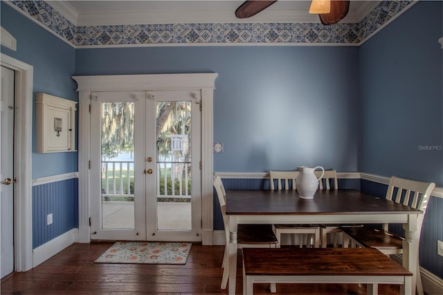 dining room with dark hardwood / wood-style flooring, ornamental molding, french doors, and ceiling fan