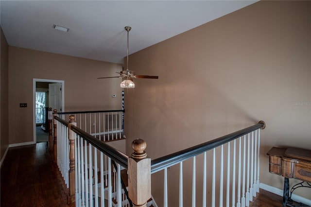 stairs featuring wood-type flooring