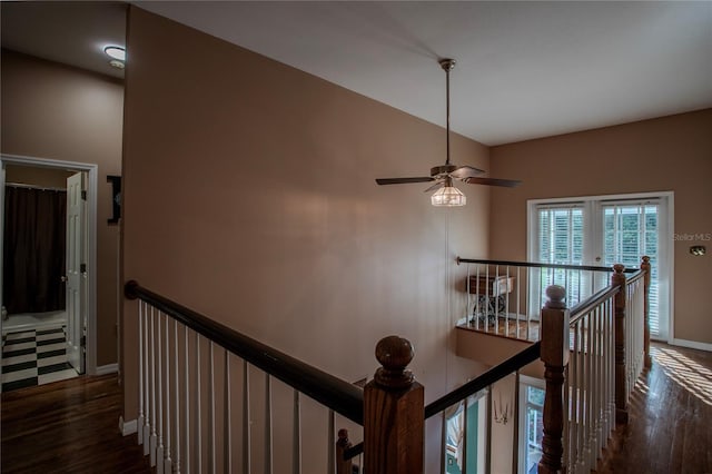 hallway with dark hardwood / wood-style floors