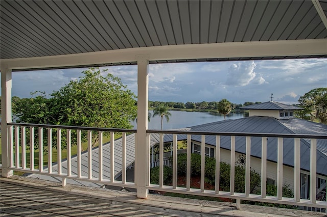 balcony featuring a water view