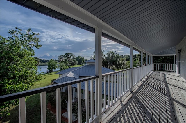 balcony featuring a water view