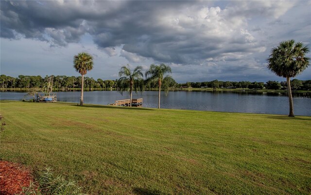 view of water feature with a dock