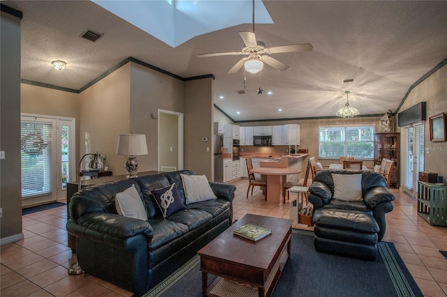 tiled living room with crown molding, lofted ceiling, ceiling fan with notable chandelier, and a textured ceiling