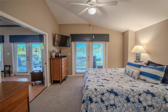 tiled bedroom featuring french doors, ceiling fan, lofted ceiling, and access to outside