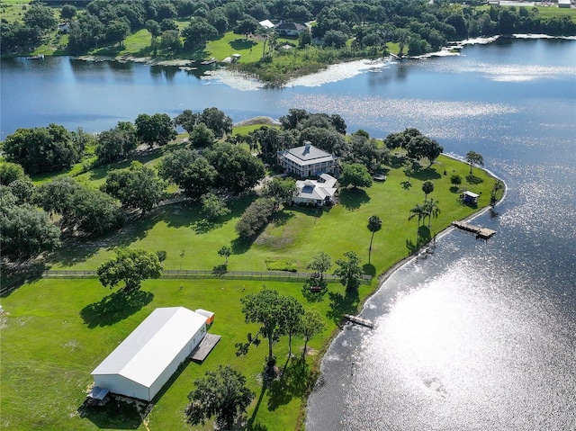 drone / aerial view featuring a water view and a rural view