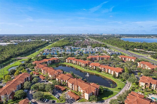 aerial view featuring a residential view and a water view