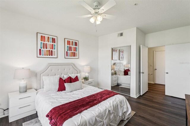 5536 Metrowest Blvd Unit 8-304, Orlando, FL 32811 - bedroom with wood finished floors, a ceiling fan, and baseboards