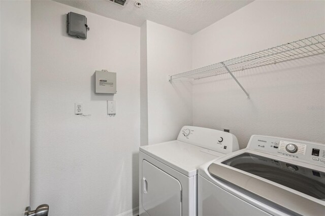 5536 Metrowest Blvd Unit 8-304, Orlando, FL 32811 - laundry room with separate washer and dryer
