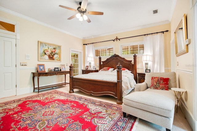 bedroom with crown molding and ceiling fan