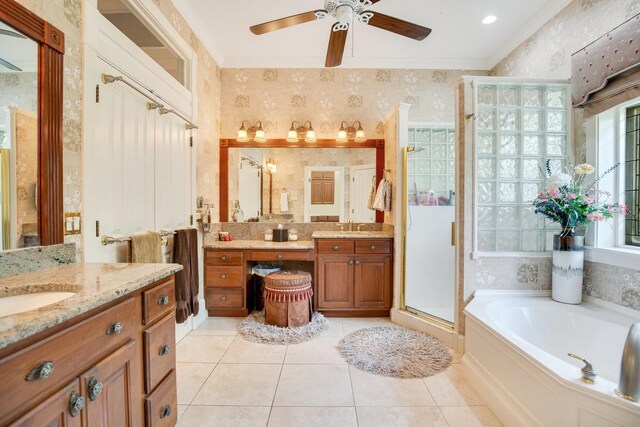 bathroom with independent shower and bath, ornamental molding, tile patterned floors, and vanity