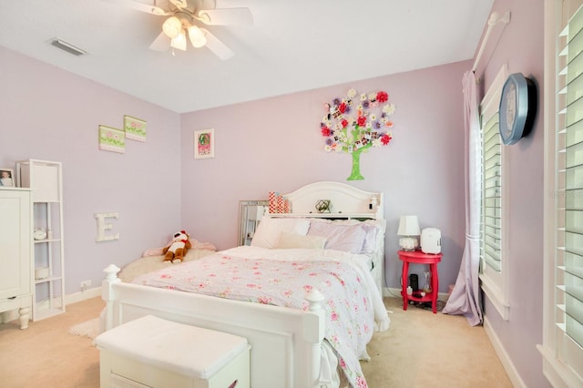 carpeted bedroom featuring ceiling fan