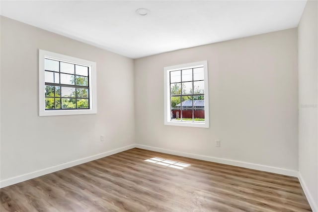 empty room featuring hardwood / wood-style floors