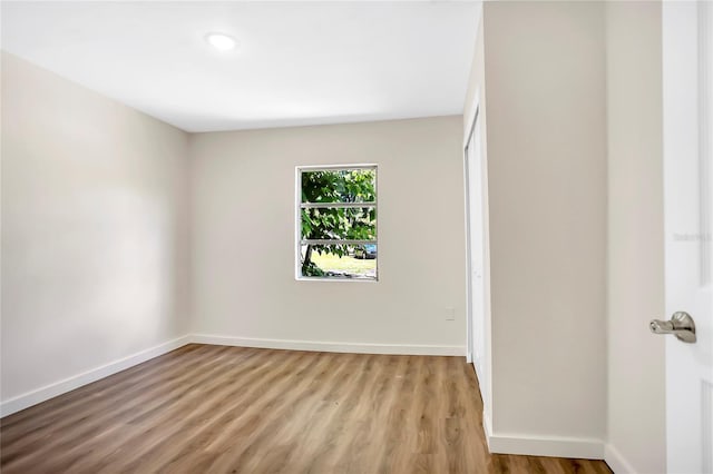 empty room with light wood-type flooring