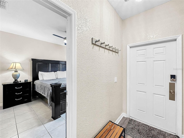 interior space featuring light tile patterned floors