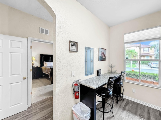 dining area with hardwood / wood-style flooring