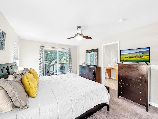 bedroom with ensuite bathroom, access to outside, ceiling fan, and light colored carpet