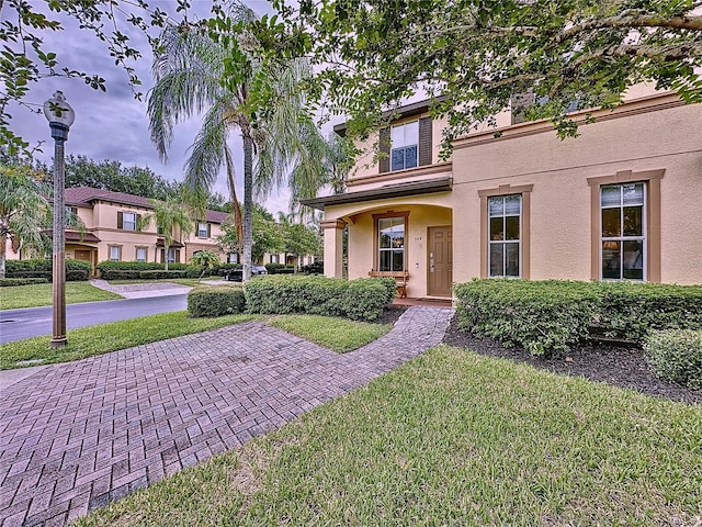 view of front of house with a front lawn