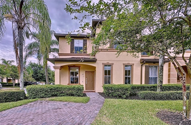 view of front of house with a front lawn