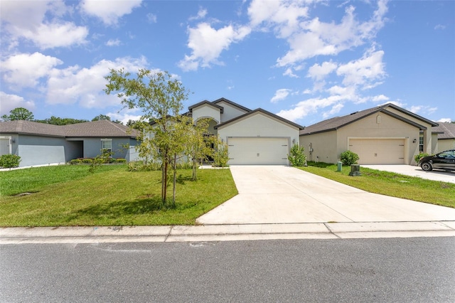 single story home with a garage and a front lawn