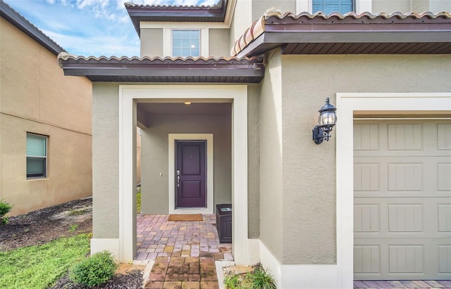 entrance to property with a garage