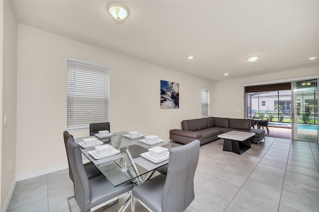 dining space with light tile patterned flooring