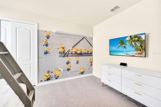 playroom featuring light colored carpet