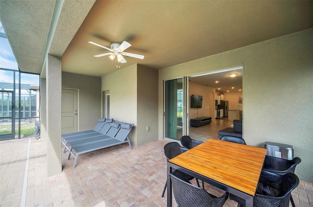 view of patio / terrace featuring ceiling fan