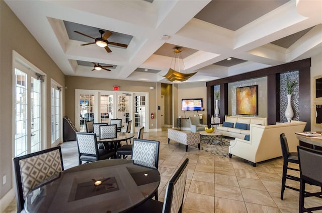 tiled dining room featuring french doors, ceiling fan, beam ceiling, and coffered ceiling