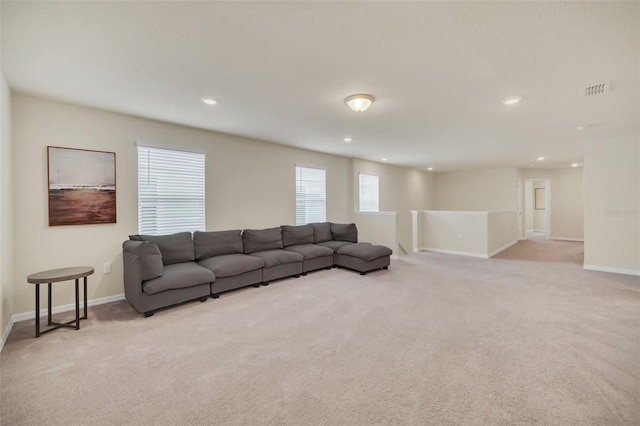 living room featuring light colored carpet