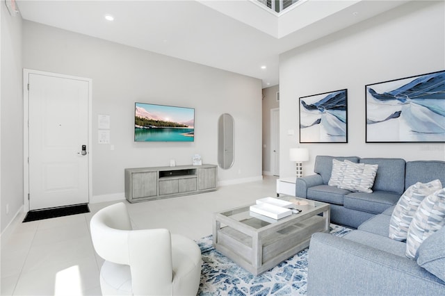 living room with tile patterned floors